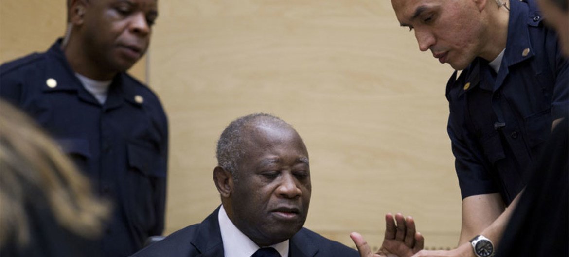 Former president of Côte d’Ivoire Laurent Gbagbo (centre) makes his initial appearance at the International Criminal Court in The Hague, Netherlands on 5 December 2011.