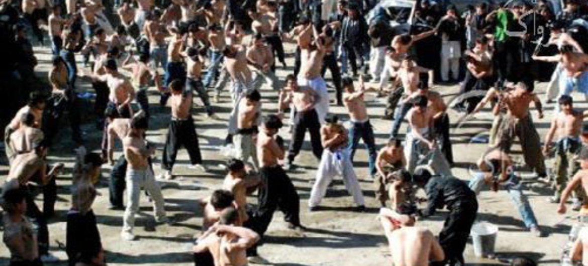 Afghan men perform self-flagellation during the ten-day Shiite mourning period of Ashura