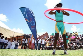 A hula hoop competition, aimed at raising HIV awareness, taking place at the Nelson Mandela/Soshanguve sports ground in South Africa
