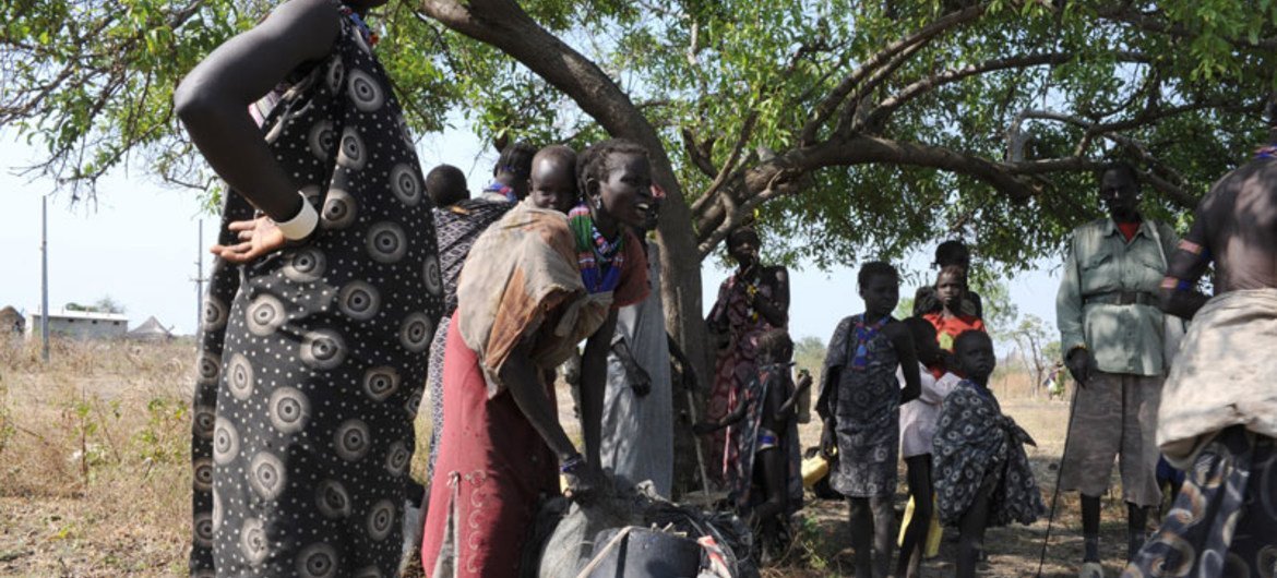 Internally displaced persons (IDPs) preparing a meal in South Sudan.