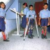 Des enfants souffrant de la polio dans un centre de recherche à Delhi, en Inde.