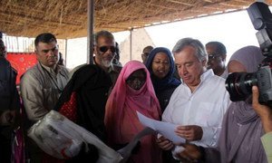High Commissioner António Guterres with Eritrean and Ethiopian refugees in Shagarab I camp, eastern Sudan.