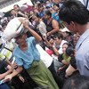 An elderly man and former prisoner in Myanmar is released from Yangon's Insein prison on 12 October 2011.
