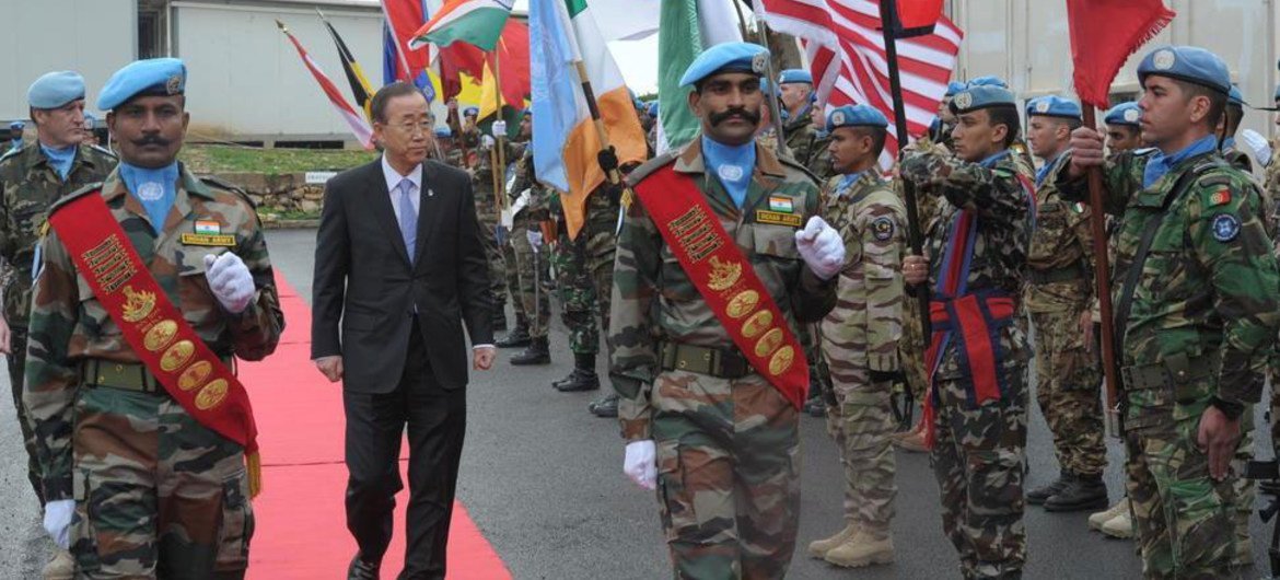 Secretary-General Ban Ki-moon (centre) reviews UNIFIL troops during a visit to their headquarters in Naqoura. Lebanon.
