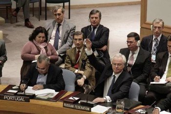 Amb. Vitaly Churkin (front, right), of the Russian Federation vetoes a draft resolution on Syria. China also vetoed the resolution.