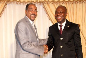 UNAIDS Executive Director Michel Sidibé (left) and Prime Minister Gilbert Houngbo of Togo.