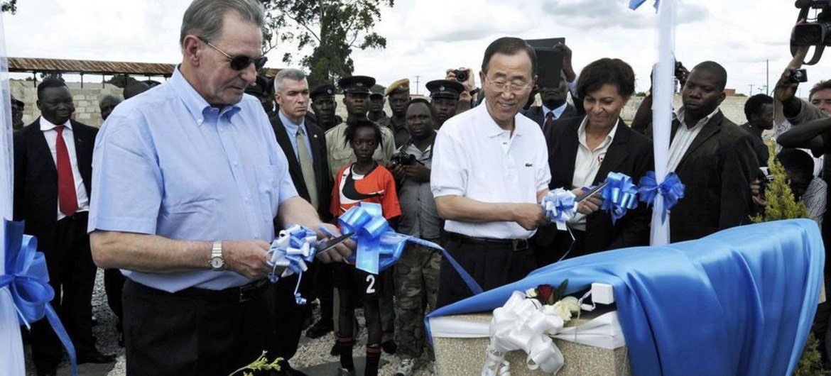 Secretary-General Ban Ki-moon (second left) and Jacques Rogge (left) President of the IOC, unveil plaque at the Olympic Youth Development Centre in Lusaka, Zambia.