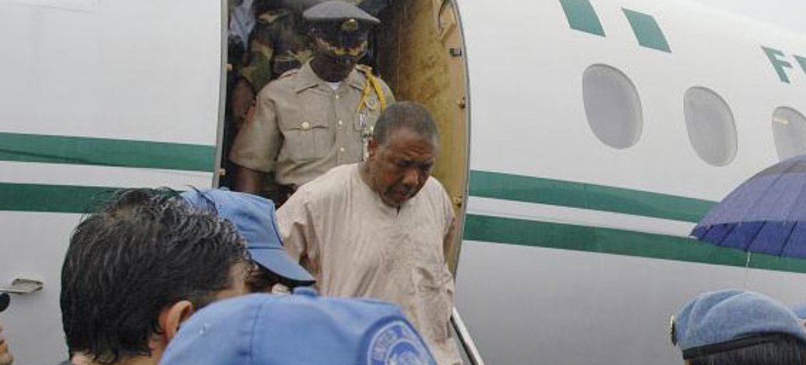 Former Liberian President Charles Taylor on his way to the Special Court for Sierra Leone in Freetown on 29 March 2006.