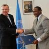 UNODC Executive Director Yury Fedotov and UNIDO Director-General Kandeh K. Yumkella after signing of MOU.