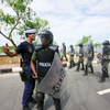 UNMIT officer leads the Timorese Police’s special company officers in a public order training exercise, in Dili.