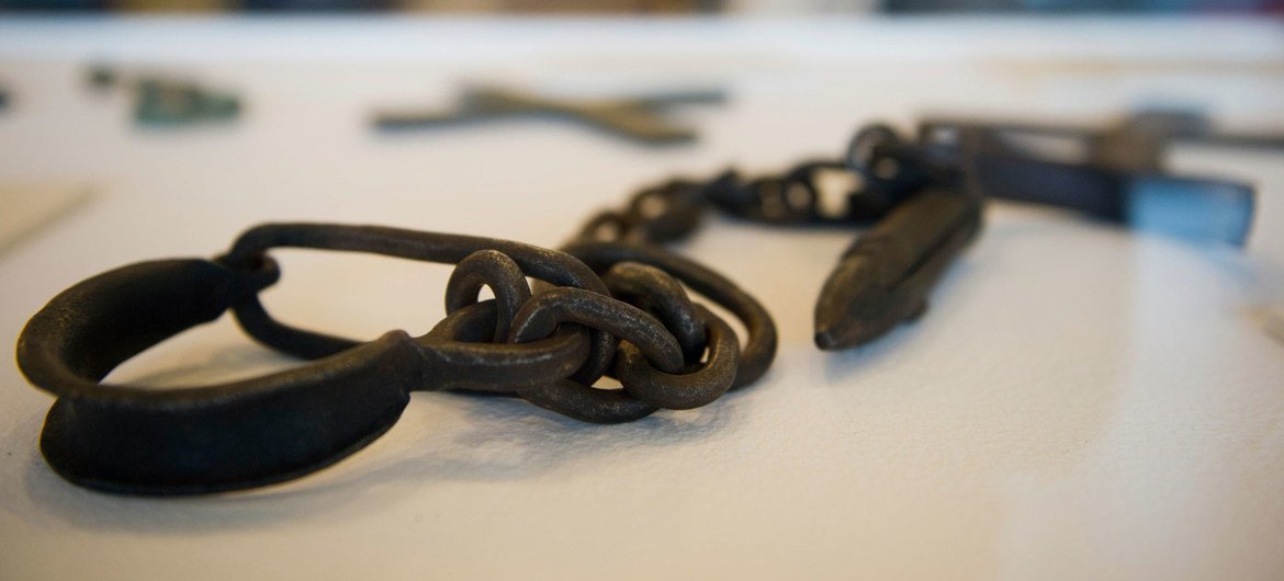 Shackles used to restrain slaves on display at the Transatlantic Slave Trade Fair at United Nations Headquarters in New York.  (document)