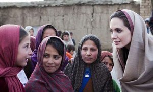 Angelina Jolie meets schoolgirls in a village in Afghanistan. She has been named Special Envoy of UNHCR chief, António Guterres.