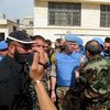 Major-General Robert Mood (centre) in the town of Al-Rastan, Homs province, Syria.