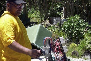 A renewable energy project in Tokelau, supported by UNDP, converts solar-generated power to electricity.