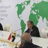 UN refugee chief, António Guterres (centre), delivers his opening remarks to the OIC conference.