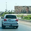 A convoy of UN observers travels in Syria.