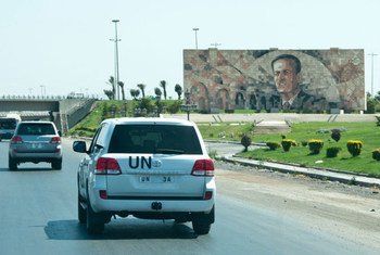 A convoy of UN observers travels in Syria.