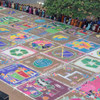 Indian organization Hand in Hand mobilized 570 volunteers to create a massive Rangoli carpet based on environmental themes.