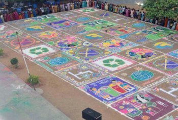 Indian organization Hand in Hand mobilized 570 volunteers to create a massive Rangoli carpet based on environmental themes.