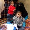 Une famille syrienne en cours d'enregistrement auprès du HCR à Halba, dans le nord du Liban. HCR/F.Juez