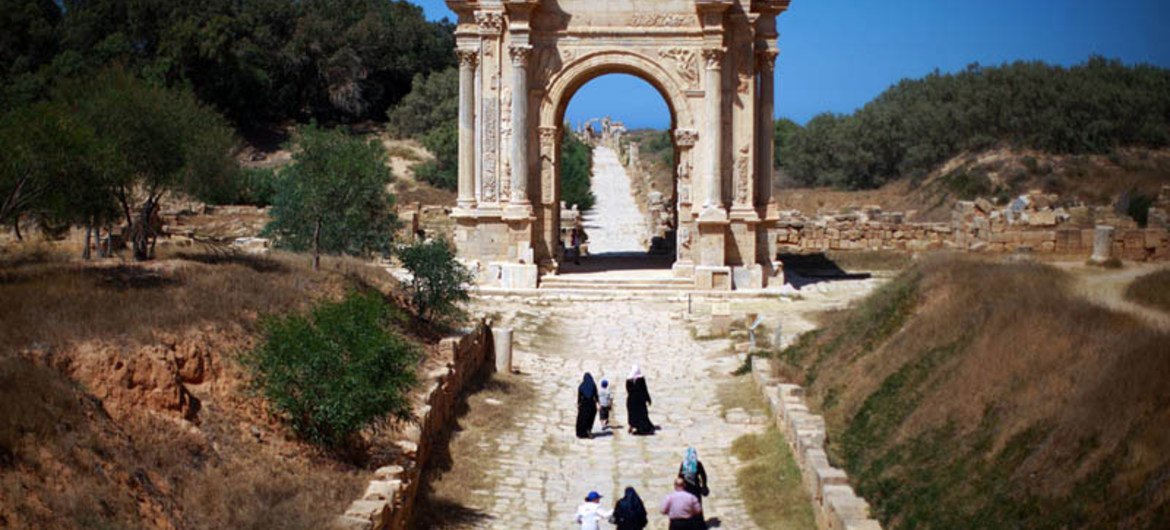 A family saunters down the main approach to Leptis Magna, the largest in scale of Libya’s Roman-era Decapolis (Ten Cities).