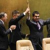 Outgoing President of the General Assembly Nassir Abdulaziz Al-Nasser (second right) hands over the gavel to his successor Vuk Jeremić. Secretary-General Ban Ki-moon is at left.