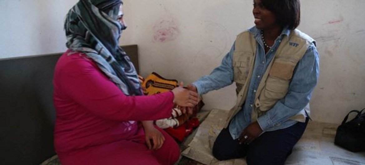 WFP Executive Director Ertharin Cousin visits Syrian refugees in the Bekaa Valley, Lebanon.