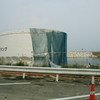 A liquid storage tank stands twisted at the Fukushima Daiichi Nuclear Power Plant.