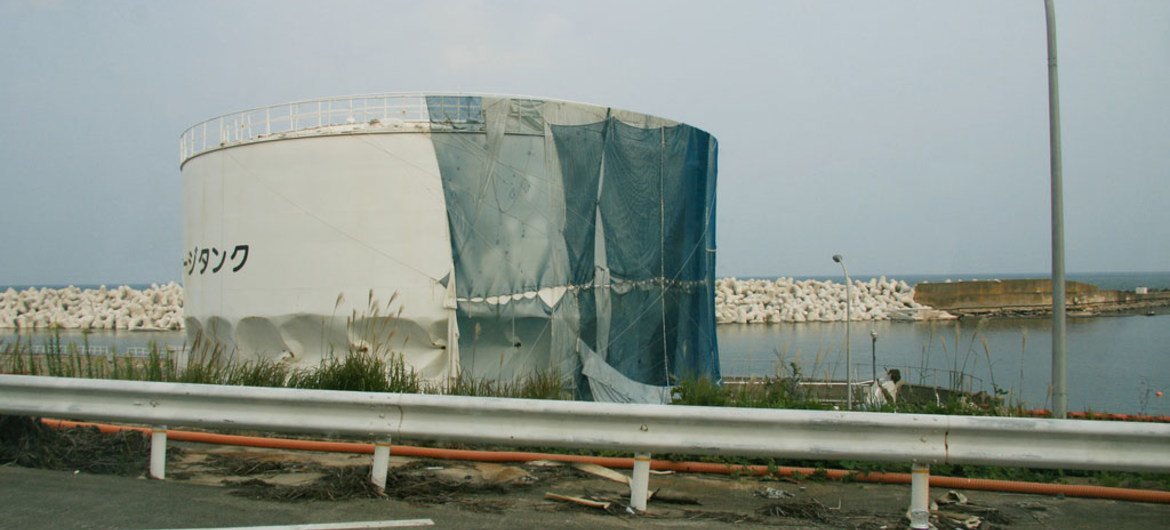 A liquid storage tank stands twisted at the Fukushima Daiichi Nuclear Power Plant.