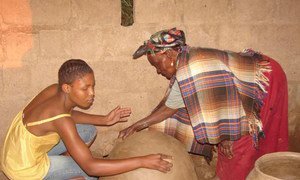 Earthenware pottery-making skills being passed on by pot master Mmasekgwa Motlhware to her granddaughter Tumediso in the Botswana’s Kgatleng District.