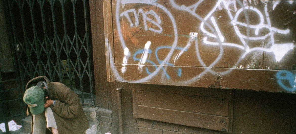 A homeless man sits at the steps of a store in lower east side, Manhattan, New York City. (File)