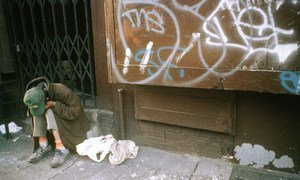 A homeless man sits at the steps of a store in lower east side, Manhattan, New York City. (File)