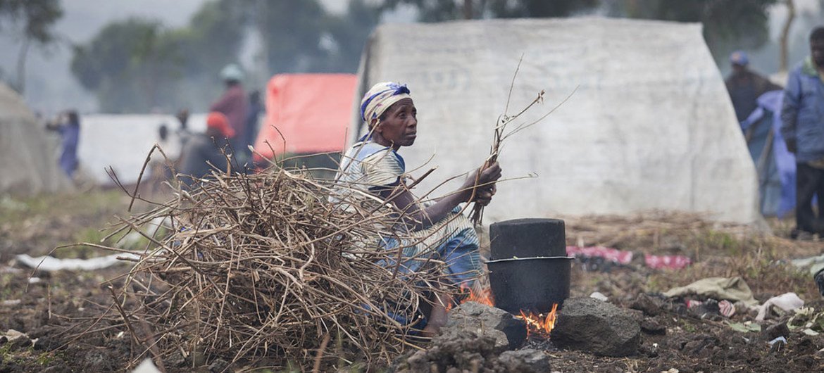 A displaced woman who fled fighting between FARDC and M23 rebels, at a camp in Kanyaruchinya, north of Goma, Democratic Republic of the Congo, (DRC).