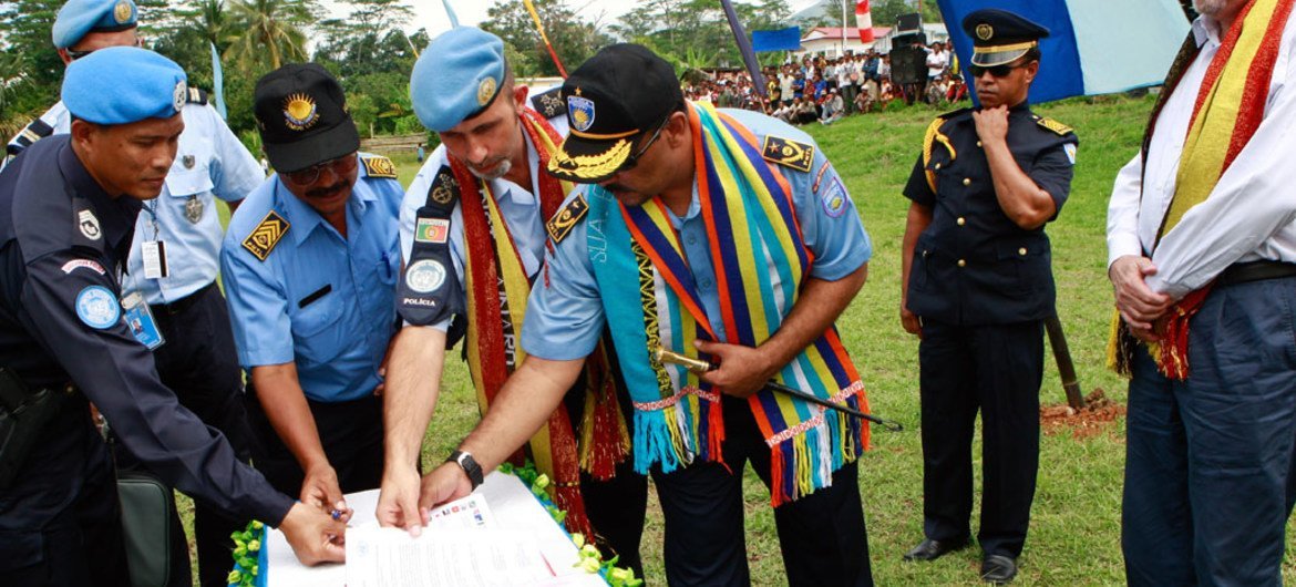 A ceremony is held marking the official hand-over of policing responsibilities from the UN Integrated Mission in Timor-Leste (UNMIT) to the Polícia Nacional de Timor-Leste (PNTL) in Ainaro District.