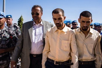 UNAMID police personnel Qasim Al-Sarhan (centre) and Hasan Al-Mazawdeh (right), abducted in North Darfur, were freed after 136 days in captivity.