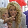 Singer and UNICEF Goodwill Ambassador Shakira with children in West Jerusalem, Israel.