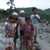 Des enfants à Mindanao, aux Philippines, où le typhon Bopha a tué plus d'un millier de personnes et déplacé au moins 800.000 autres.