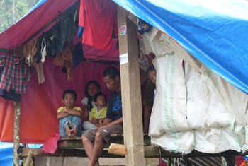 Purok 5 camp where people were  evacuated to due to fear of landslides. This family's temporary shelter is on the side of the road.
