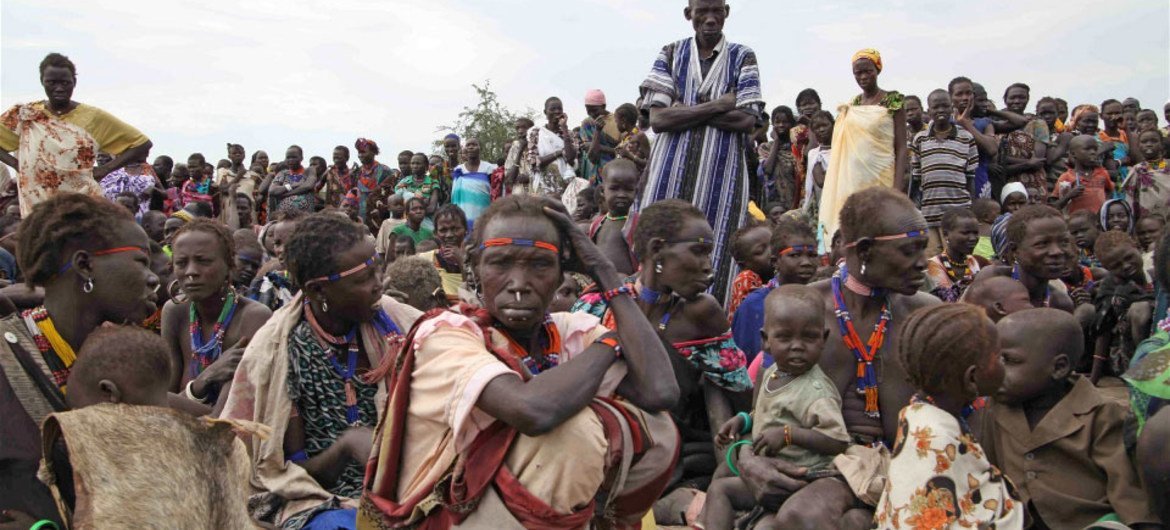 A crowd awaits food distribution at Pibor town, South Sudan.
