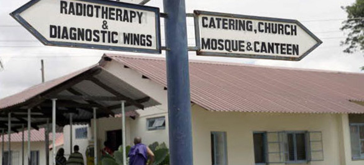 A signpost at the Ocean Road Cancer Institute in Dar es Salaam, Tanzania, indicating different sections of the hospital.