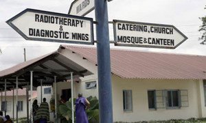 A signpost at the Ocean Road Cancer Institute in Dar es Salaam, Tanzania, indicating different sections of the hospital.