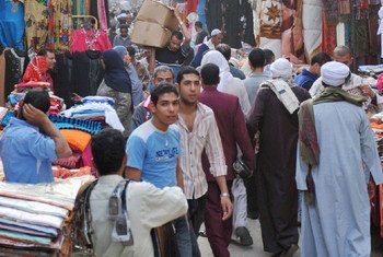 People passing through a busy market in Khan El-Khalili District, Cairo, Egypt. ILO/M. Crozet