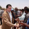 Regional Humanitarian Coordinator for the Sahel David Gressly (left) greeting residents on a visit to Mopti, Mali in April 2012.