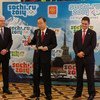 Secretary-General Ban Ki-moon (centre), Ambassador Vitaly  Churkin of Russia (left) and General Assembly President Vuk Jeremić kick off countdown to Sochi Winter Olympics.