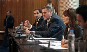 Special Representative for Afghanistan Ján Kubiš (second left) briefs the press in Kabul.