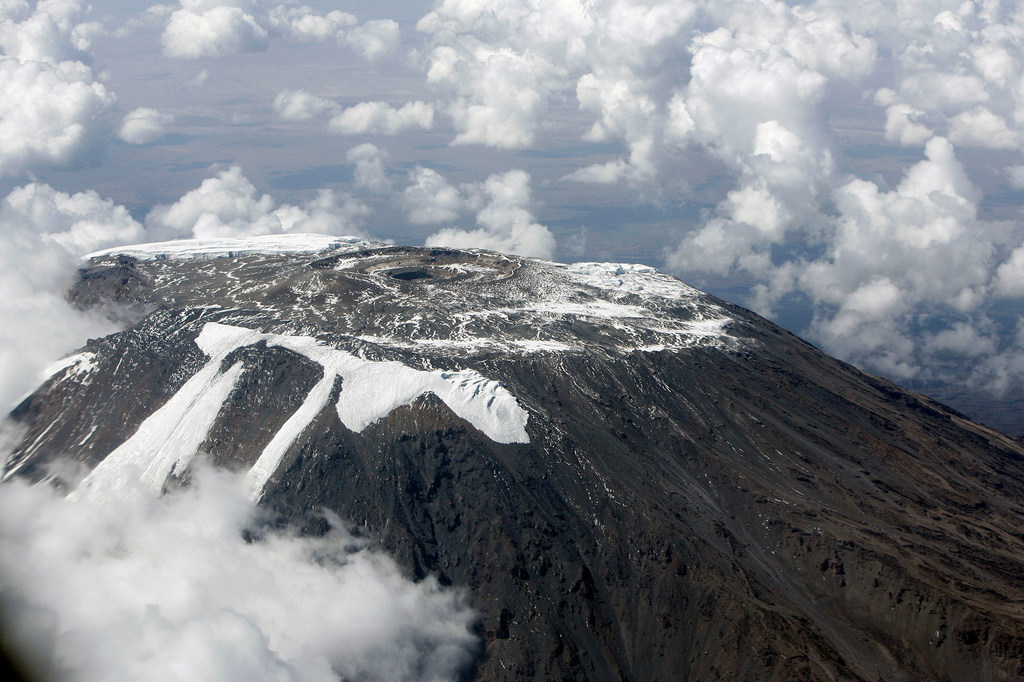 Aerial view of melting ice over Mount Kilimanjaro.