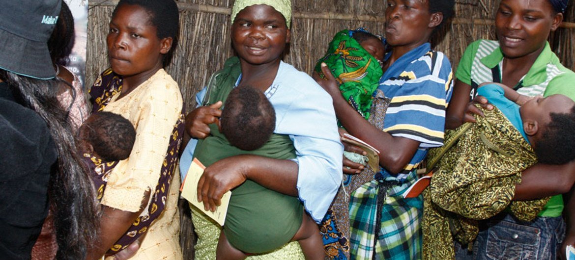 Mothers and their infant children at the Mwandama Millennium Village, Malawi.