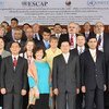 UN representatives and senior government officials pose for a group photo.