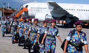 An all-female Formed Police Unit from Bangladesh, serving with the UN Stabilization Mission in Haiti, arrives in Port-au-Prince to assist with post-earthquake reconstruction.