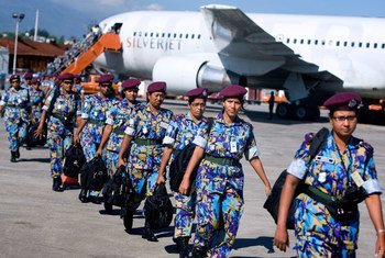 An all-female Formed Police Unit from Bangladesh, serving with the UN Stabilization Mission in Haiti, arrives in Port-au-Prince to assist with post-earthquake reconstruction.